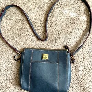 Dooney&Bourke small purse. Dark grey leather. Never used.